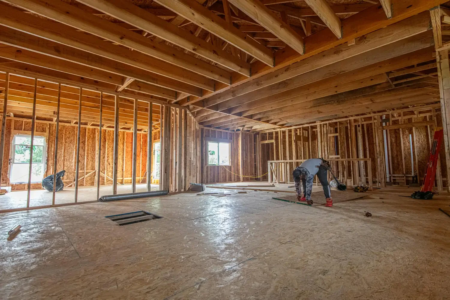 Bare subfloor and framing — substrate-prep stage before flooring install