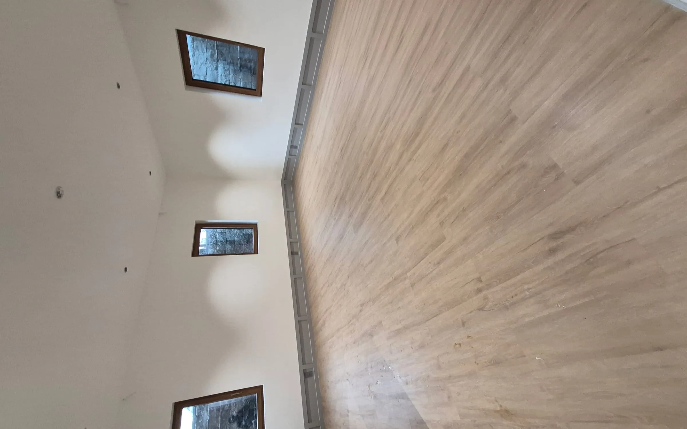 Brooklyn brownstone parlor floor renovation by LM Pro Remodeling Group, with restored original woodwork